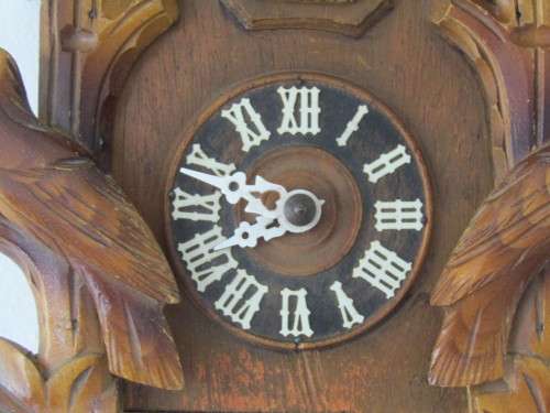 Vintage wall mounted wooden mechanical Cukoo Clock with Weights and Pendulum, made in Germany