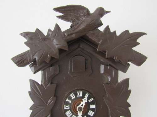 Vintage wall mounted wooden mechanical Cukoo Clock with Weights and Pendulum, made in West Germany