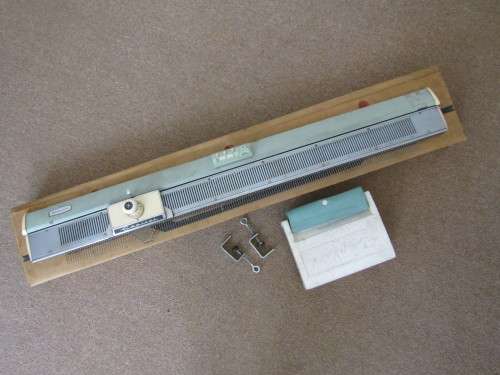Vintage Empisal Knitting machine in original box and in working order
