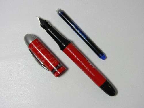 Vintage 1998 Coca Cola Stypen "Football" fountain Pen in metal case and with unused Ink Cartridge