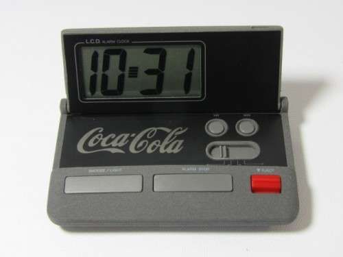 Vintage boxed Coca Cola LCD Alarm travel Clock in perfect working condition, 9cm x 5.5cm