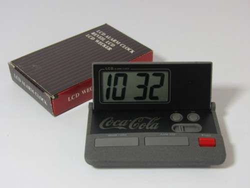 Vintage boxed Coca Cola LCD Alarm travel Clock in perfect working condition, 9cm x 5.5cm