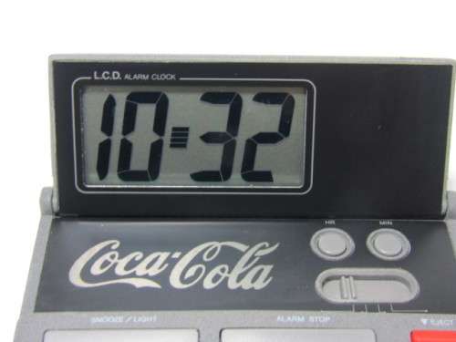 Vintage boxed Coca Cola LCD Alarm travel Clock in perfect working condition, 9cm x 5.5cm
