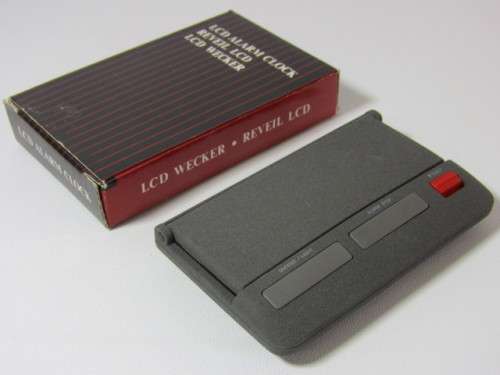Vintage boxed Coca Cola LCD Alarm travel Clock in perfect working condition, 9cm x 5.5cm