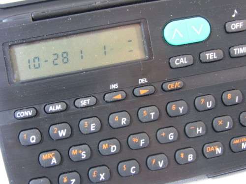 Vintage Travel Master, world time, calender, clock, conversions, alarm, etc., mint and working