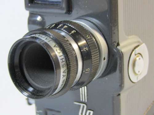 Vintage Yashica - 8, 8mm wind-up Movie Camera in leather case, excellent and working
