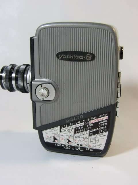 Vintage Yashica - 8, 8mm wind-up Movie Camera in leather case, excellent and working