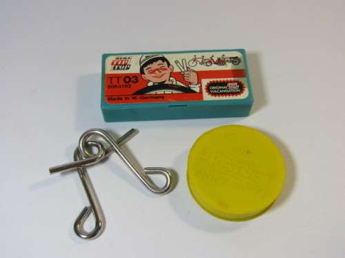 1970's and 80's collectable toys, Rema Tip Top repair set, Pratley "Kinky Putty" and Wire Puzzle - 3