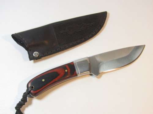 Quality Model K-91 Hunting Knife with hand stiched Sheath, excellent condition, 21cm, blade 10.5cm