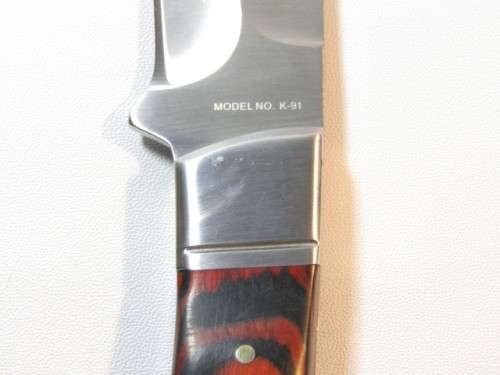 Quality Model K-91 Hunting Knife with hand stiched Sheath, excellent condition, 21cm, blade 10.5cm