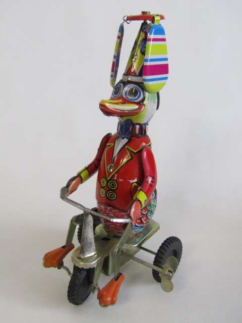 Lot of 3 original vintage Tin Toys, Spin Toll, Skipping rope and wind-up Duck, excellent condition