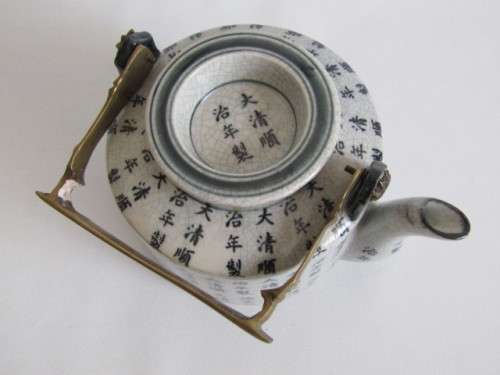 Vey old stamped Oriental Teapot with brass Handle, 10cm deep