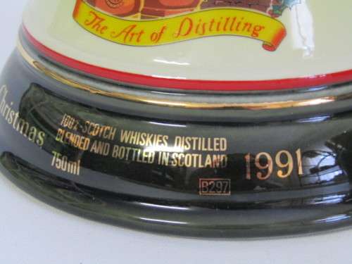 Collectable Christmas 1991 Bells Old Scotch Whisky 750ml in Wade decanter, Boxed, full and sealed