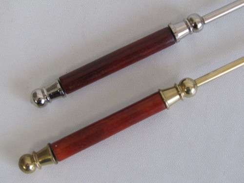 Lot of 2 Candle Snuffers, one is solid Brass and the other one is silver Metal, Wooden Handles, 30cm