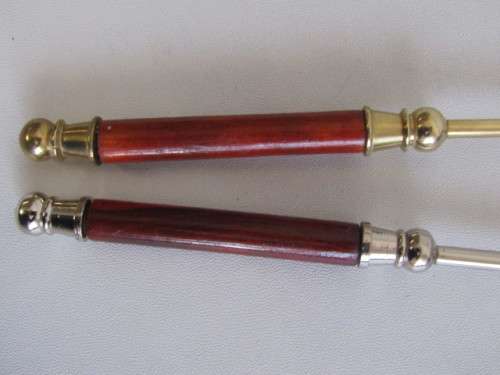 Lot of 2 Candle Snuffers, one is solid Brass and the other one is silver Metal, Wooden Handles, 30cm