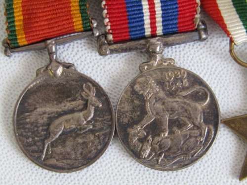 Original miniature medal group from WW2, 1939-1945 Star, Italy Star, 1939-1945 and Africa service