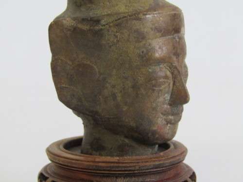 Very old Burmese Bronze Buddha Head on wooden Stand in excellent and aged condition, 13cm tall