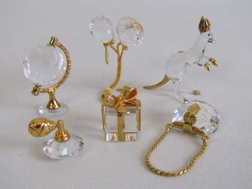 Lot of 6 small original Swarovski Crystal Memories ornaments in perfect condition, gold detail