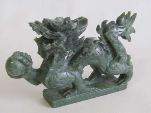 Large hand carved natural Jadeite "Dragon" figurine in excellent condition, 16cm x 8cm