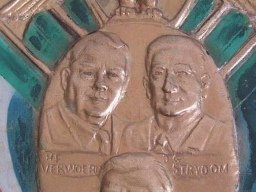 Vintage Gilt and Painted Plaque depicting HF Verwoerd, JG Strydom and SJP Kruger with Eagle Crest