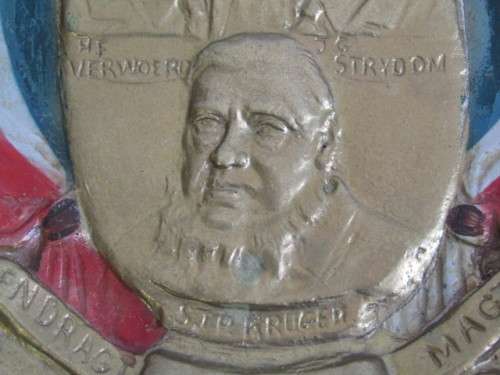 Vintage Gilt and Painted Plaque depicting HF Verwoerd, JG Strydom and SJP Kruger with Eagle Crest