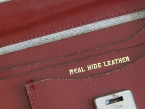 Very nice vintage Real Hide Leather Briefcase with 3 divisions and 3 pockets, excellent condition
