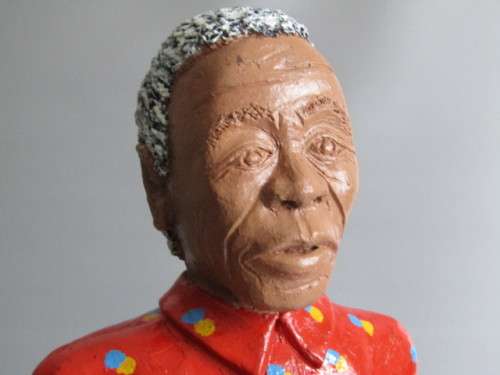 Large and heavy hand made Clay standing Sculpture of Nelson Mandela, signed Victor '01, 47cm tall