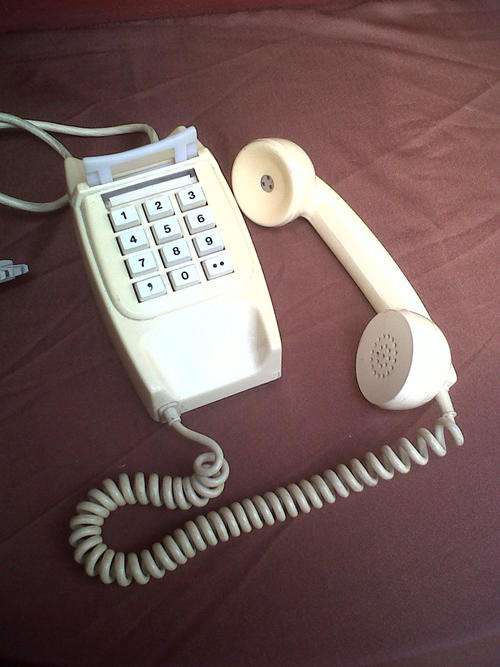 OLD OFF WHITE TELEPHONE