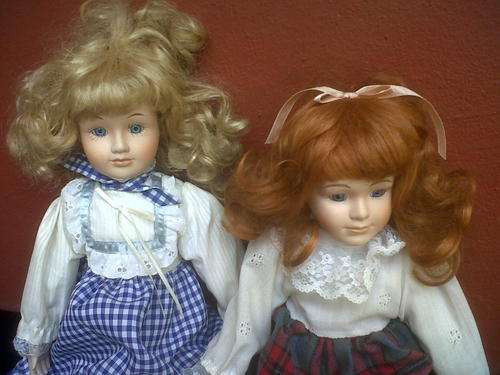 2 PORCELAIN DOLLS