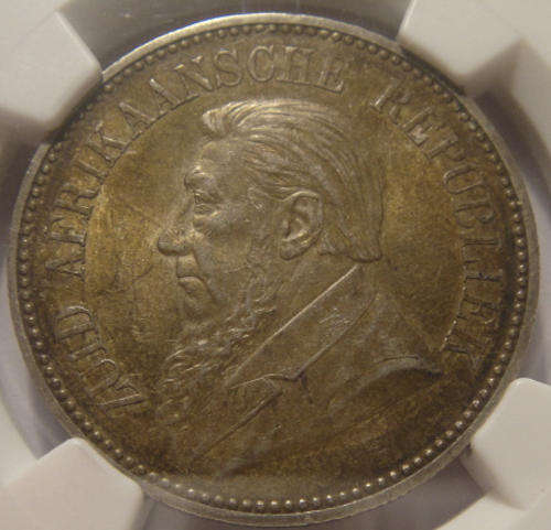 1897 Paul Kruger Z.A.R. Half Crown (2/6-) : NGC Graded almost Mint State (AU58)