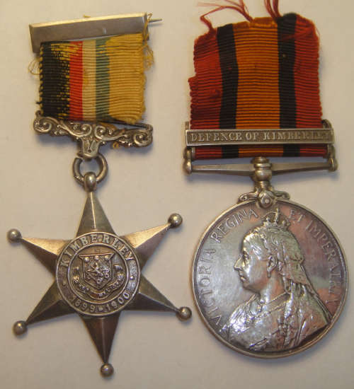 Queens Medal and Kimberley Star to Pte. T. Crawford, Kimberley Town Guard.