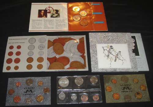 Collection of 4 Uncirculated Coin Sets plus a & Token & Medallion Set