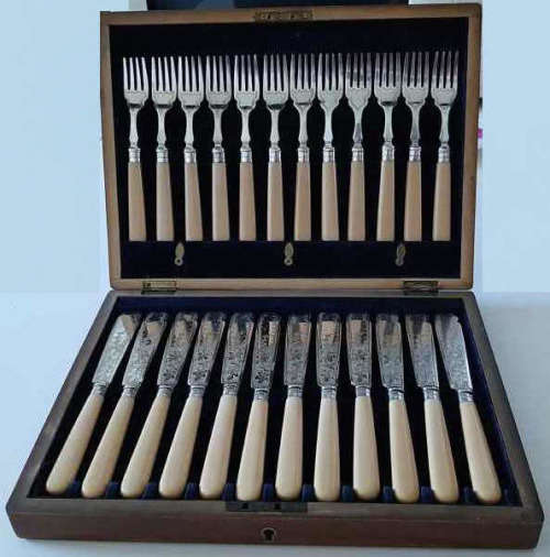Boxed Set of Silver-Collared Fish Knives & Forks. Hallmarked Sheffield 1912