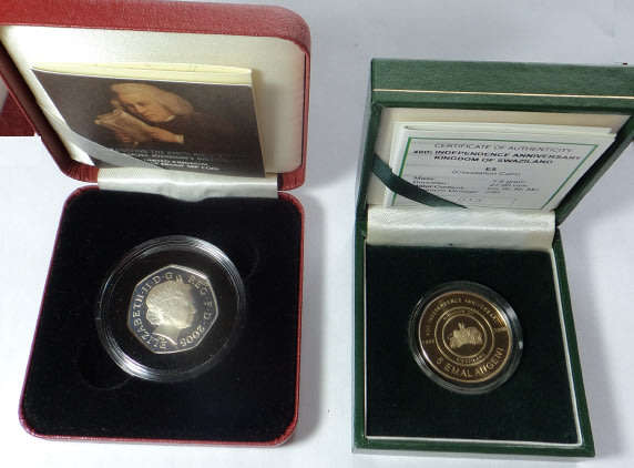 Two Boxed Commemorative Coins of 2005 & 2008 (Great Britain & Swaziland)
