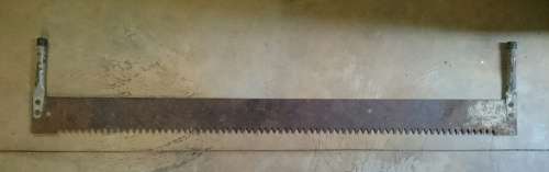 Antique 2 man wood saw with steel handles