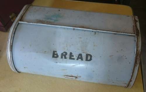 Old light blue steel bread bin