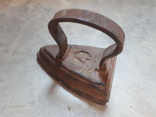 Old vintage steel sad iron