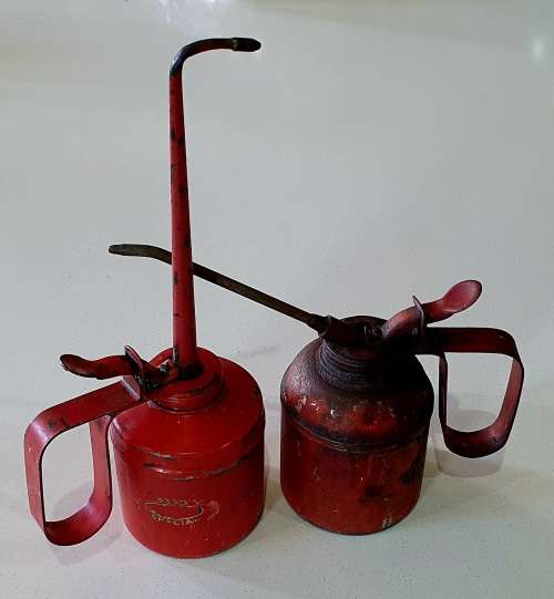 2x Vintage metal oil cans as per photo