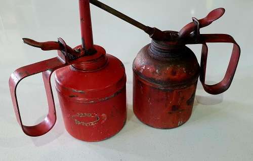2x Vintage metal oil cans as per photo