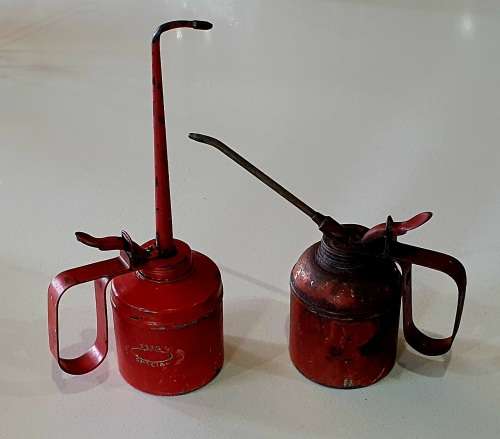 2x Vintage metal oil cans as per photo