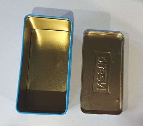 NESTLE tin as per photos