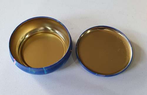 Blue tin with image of dragonfly and waterflowers as per photos