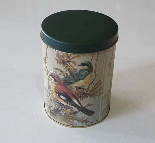 Tin with birds theme as per photos