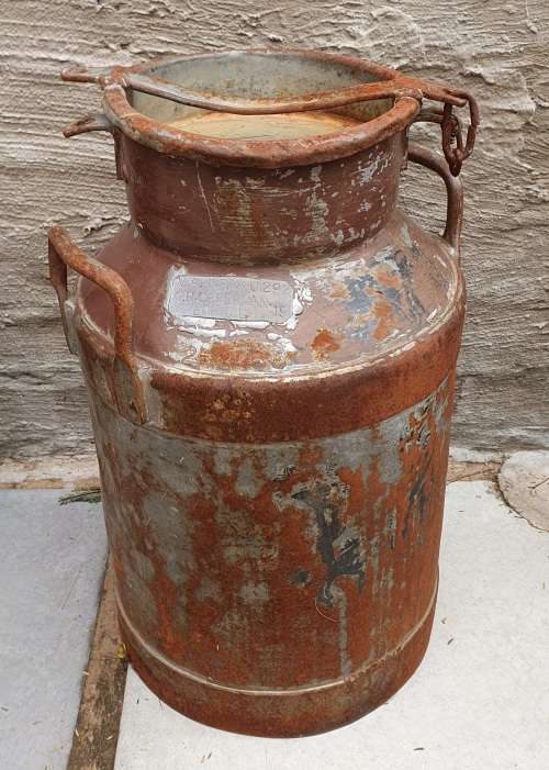 Vintage milk can as per photos