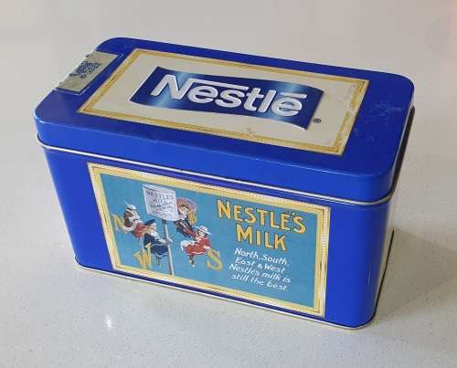 Nestle tin as per photos
