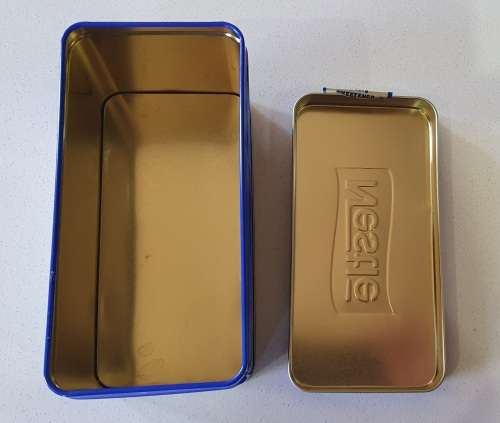 Nestle tin as per photos