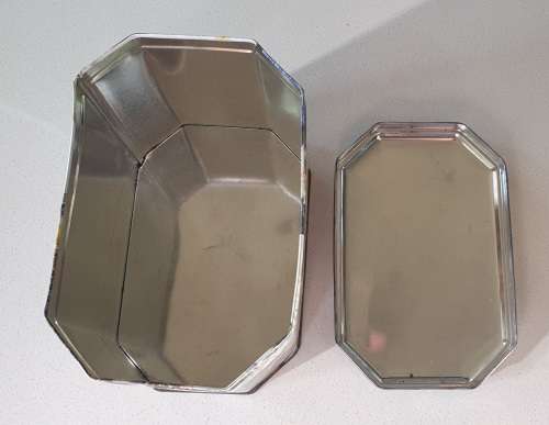 Image of a bear on the tin as per photos