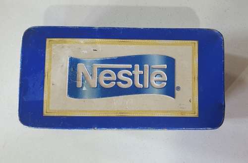 Nestle tin as per photos