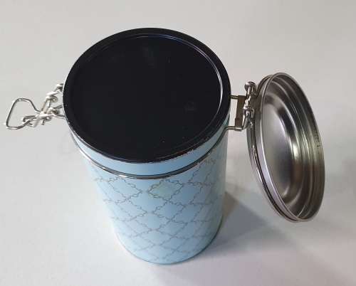 Light blue/turquoise tin as per photos