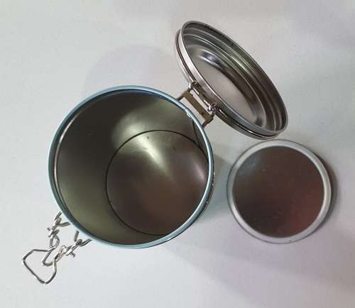 Light blue/turquoise tin as per photos